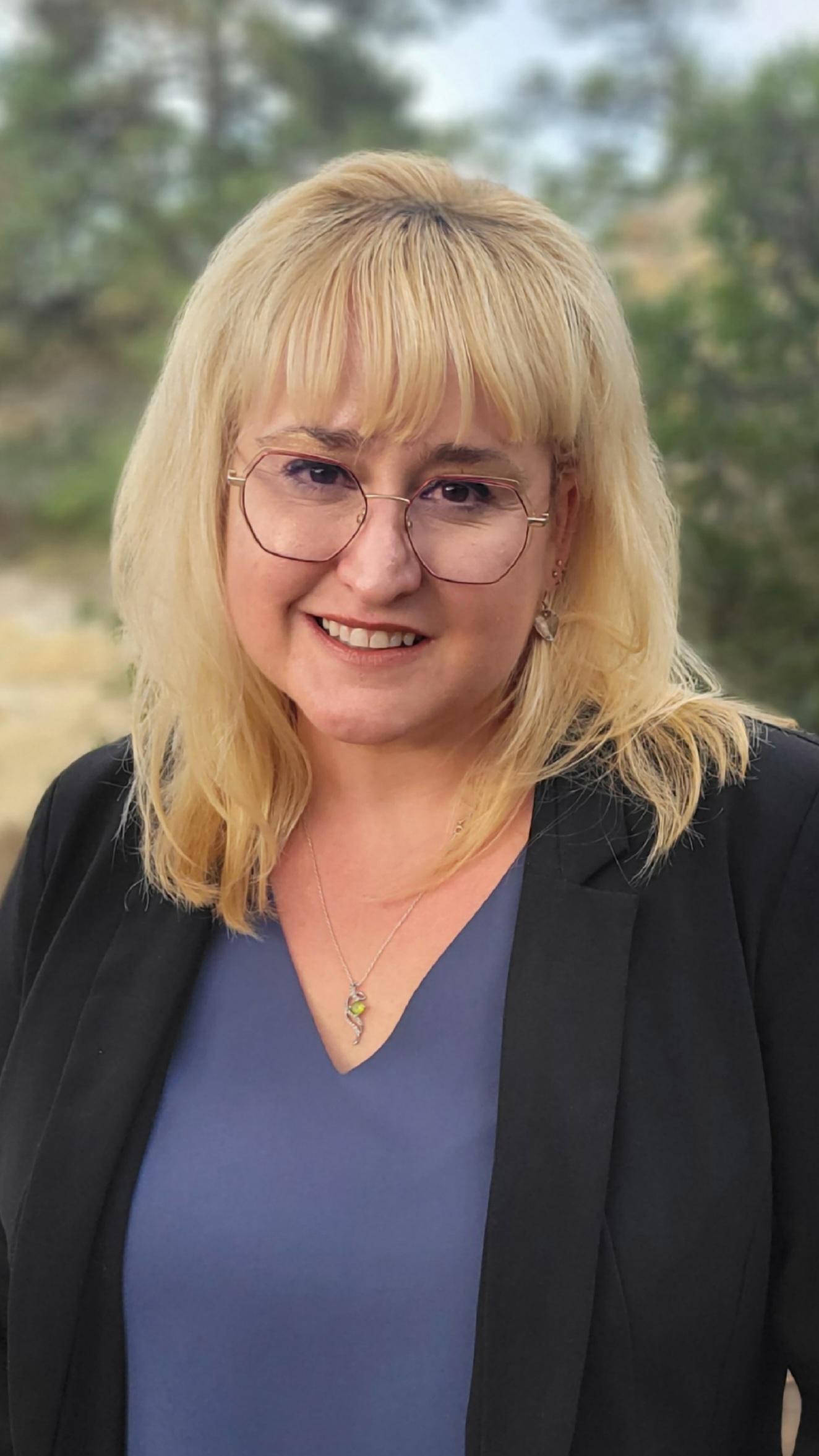 Headshot of Danielle Daigle-Chavez outside