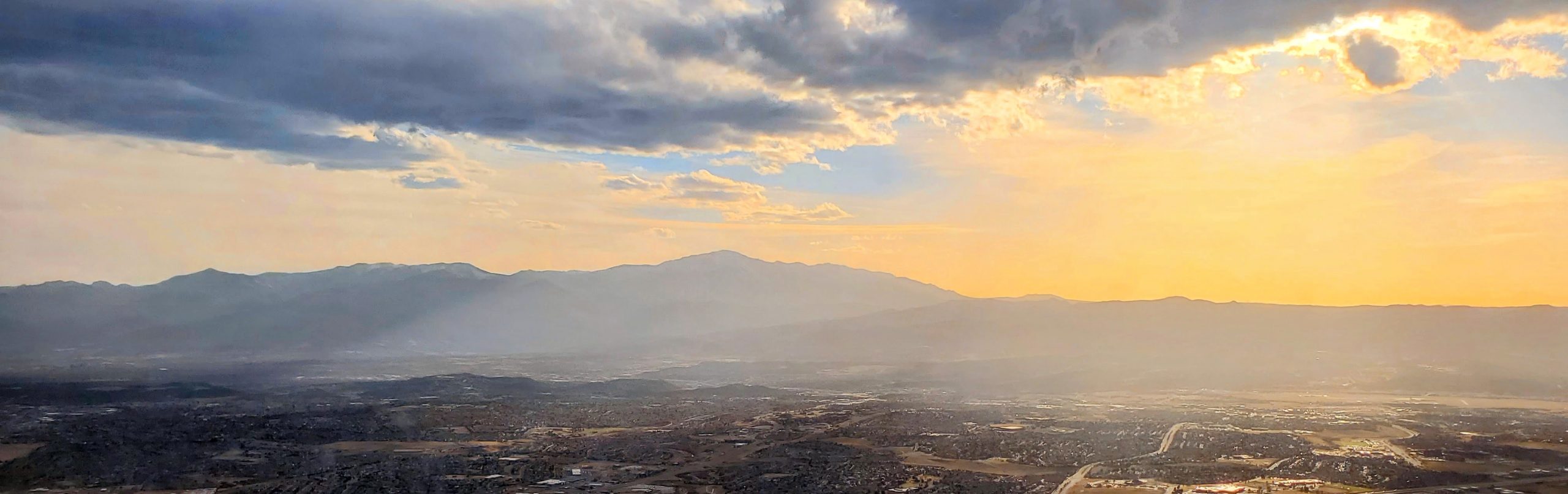 View of Pikes Peak and Colorado Springs from over Black Forest at sunset